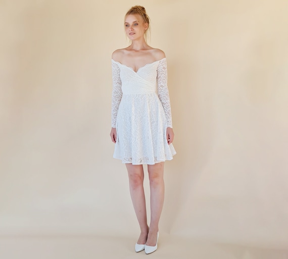 long sleeve ruched mini dress Shop the Lucia Sheer Sleeve Ruched Mini Dress in Light Blue