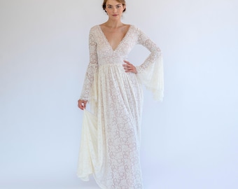 Boho Lace Bell Sleeve Wedding Dress: Deep V-Neck, Blush Lining