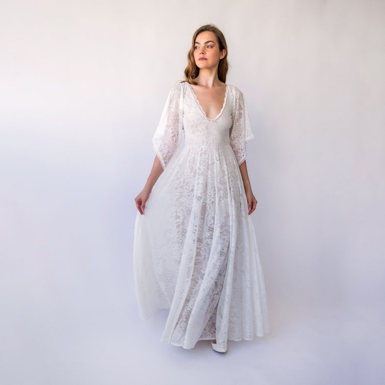 Bestseller Vintage Style Open Back, Deep V Neckline Angel Sleeves Bohemian Pearly White Wedding Dress 1468 image 2