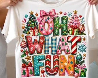 May include: A white short-sleeve t-shirt featuring a colorful graphic with the text OH WHAT FUN. The design includes a pink donut, green and pink Christmas trees, wrapped gift boxes, ornaments, stars, and snowflakes in various patterns.