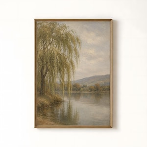 May include: A vertical framed landscape painting depicting a large willow tree with drooping green branches on the left bank of a calm river. In the background, rolling hills are visible under a soft, cloudy sky with muted earth tones.