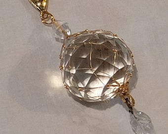 Clear Faceted Crystal Ball in Hand Tied Gold Filled Silver Net, with clear Glass leaf and Lobster Claw Clasp