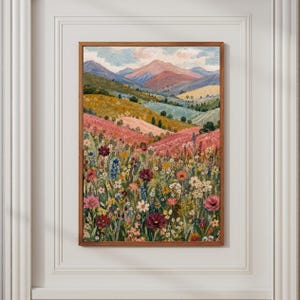 May include: A framed landscape painting featuring a vibrant wildflower meadow in the foreground with various colorful blooms in shades of pink, red, yellow, and blue, set against rolling hills and distant mountains under a soft sky.