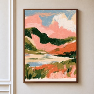May include: A framed landscape painting featuring expressive brushstrokes in shades of forest green, burnt orange, soft pink, and pale blue. The composition depicts rolling hills, a central body of water, and a sky filled with textured clouds.