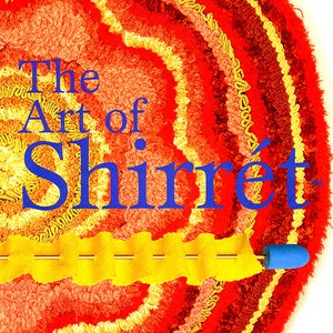 May include: A book cover with the title "The Art of Shirrét" in blue text on a red, orange, and yellow background. The background is a close-up of a circular, textured fabric with a yellow ribbon and a blue spool.