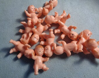 tiny plastic dolls