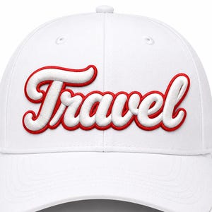May include: A white baseball cap featuring the word Travel embroidered in a raised, white script font with a bold red outline. The cap has a structured crown, a curved brim, and a top button, showcasing a clean, bright aesthetic throughout.