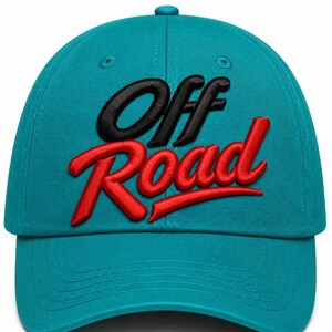 May include: A teal baseball cap featuring the text Off Road embroidered on the front. The word Off is stitched in black thread, while the word Road is stitched in red thread. The cap has a structured crown, a curved brim, and ventilation eyelets.