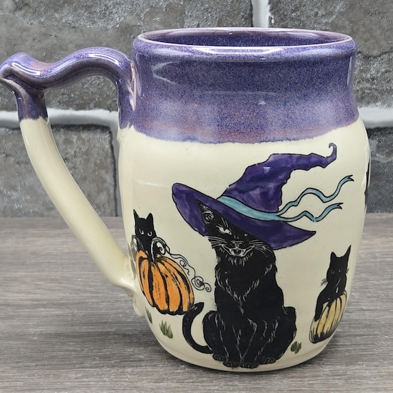 Black cats in the pumpkin patch mug, 15 oz. Purple inside glaze
