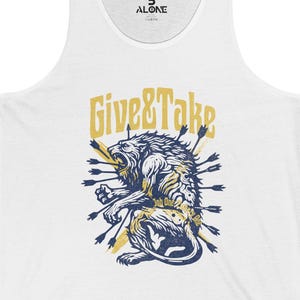 May include: A white sleeveless tank top featuring a graphic illustration of a lion pierced by multiple arrows. Above the lion, the text "GIVE & TAKE" is printed in a gold colour. The lion is rendered in dark blue and gold tones.