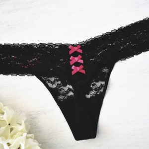 Black lace thong with three hot pink bows. Embroidered honeymoon panties.