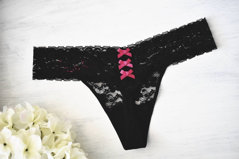 Black lace thong with three hot pink bows. Embroidered honeymoon panties.