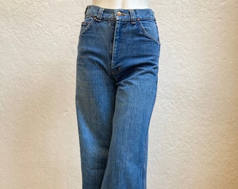 1970’s "H.A.S.H." Bell Bottom Wide Leg High Waisted Jeans in Medium Blue Wash Cotton Denim / Size: 27" Waist