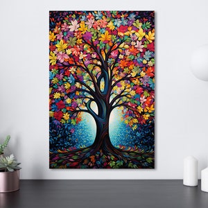 May include: A vibrant, colorful tree art print. The tree features a dark brown trunk and branches, with a canopy of multi-colored leaves in shades of red, yellow, purple, and blue. The artwork has a whimsical, artistic style, perfect for home decor.