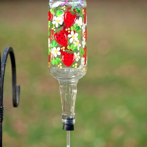 Hand Painted Hummingbird Feeder with Strawberries and flower feeder tube.