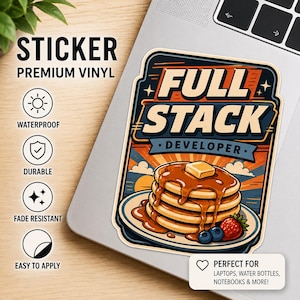May include: A rectangular vinyl sticker featuring a stack of pancakes with syrup, butter, and berries. The text reads FULL STACK DEVELOPER. The design includes a sunset background with clouds. The sticker is displayed on a laptop surface.