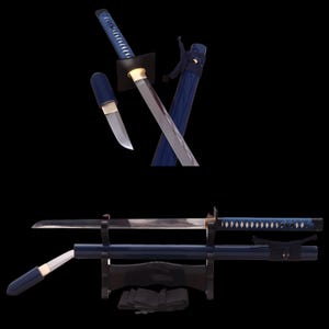 May include: A blue katana sword with a matching blue scabbard and a smaller blue tanto knife. The katana features a blue wrapped handle, a square guard, and a metallic blade. The scabbard includes a blue cord wrap. A black display stand is included.