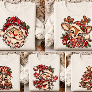 May include: A collection of five off-white crewneck sweatshirts, each featuring a festive graphic print. The designs include a Santa Claus, a reindeer, a nutcracker, a snowman, and a Christmas tree, all accented with red plaid patterns.