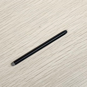May include: A slim, cylindrical black stylus featuring a smooth, glossy finish along its main body. One end of the tool is capped with a rounded black tip, while the opposite end terminates in a small, textured, light gray mesh conductive nib.