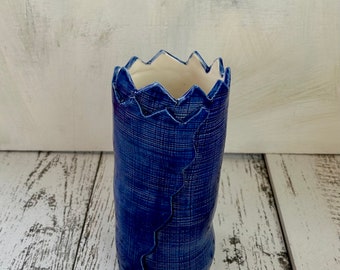 Cobalt blue cylindrical vase with crown rim and white interior