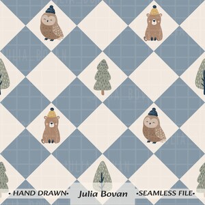 May include: A seamless pattern featuring a blue and cream diamond grid. The design includes illustrations of brown owls and bears wearing knit hats, interspersed with green pine trees. The text reads: HAND DRAWN Julia Bovan SEAMLESS FILE.
