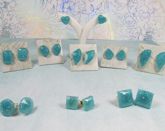 Lot of 9 Resin Post Earrings. Aqua 9 Pc SET Silver and Gold Finish Post Earrings. Great price! Lots to give or enjoy for yourself.