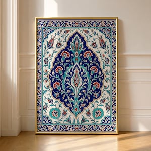 May include: A rectangular wall art print in a gold frame featuring a central dark blue medallion surrounded by intricate floral patterns in shades of red, turquoise, and white. The design includes symmetrical tulips and carnations.