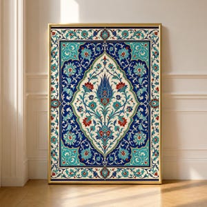 May include: A rectangular wall art print in a gold frame featuring a symmetrical floral pattern with a central tulip motif. The design uses a palette of deep blue, turquoise, and red on a cream background, enclosed by an ornate decorative border.