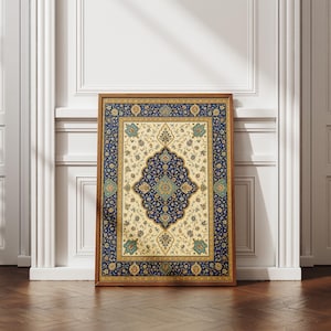 May include: A rectangular framed print featuring a detailed Persian-style rug pattern with a central blue medallion, intricate floral motifs, and a cream-colored field, all enclosed within a deep blue border and a thin wooden frame.