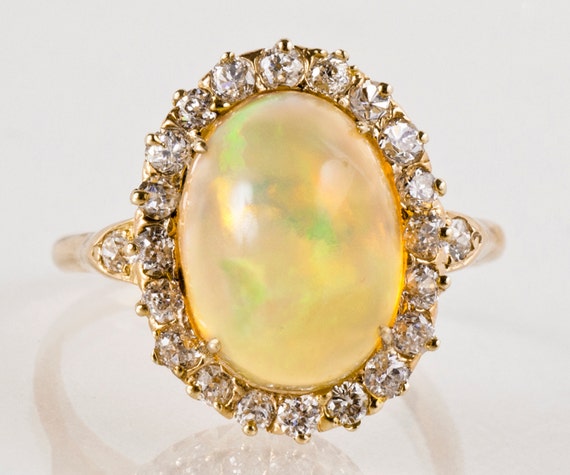 Antique Crystal Opal Ring: 14k Yellow Gold Diamond Halo, 1900s Era