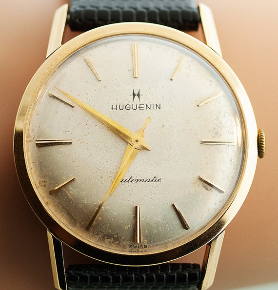 Huguenin swiss made sale