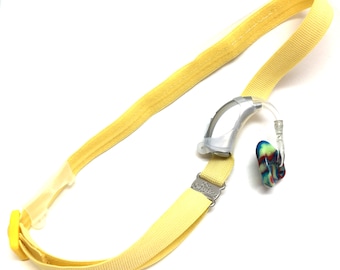 L’oreille bretelles prothèse auditive bandeau avec dimensionnement tête réglable, poignée en silicone et en glissant les manchons en silicone pour un ajustement naturel BTE (jaune)
