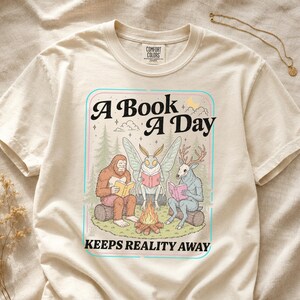 Comfort Colors Cryptid Book Club Shirt, Bigfoot Mothman Jackalope Tee, Funny Reader Shirt, Bookish Cryptid Lover Gift, Campfire Reading Tee