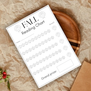 May include: A white paper reading chart with black text and line art. The header reads FALL Reading Chart. The page features rows of maple leaf icons for tracking progress, small turkey illustrations, a space for a name, and a box for a Grand prize.