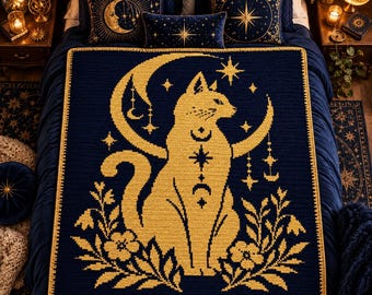 May include: A rectangular crochet blanket featuring a dark navy blue background with a large, golden yellow cat sitting in the center. The cat is framed by a crescent moon, stars, and floral motifs at the base, all rendered in a golden yellow yarn.