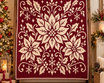 May include: A rectangular crochet blanket featuring a deep red background with a cream-colored pattern of large poinsettia flowers, holly leaves, berries, and small snowflakes arranged in a symmetrical, intricate botanical design.