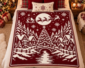 May include: A deep red and white knit blanket featuring a winter village scene with houses, a bridge, and a large central tree. Above the village, a silhouette of Santa Claus in a sleigh pulled by reindeer flies across a large white moon.