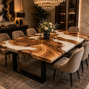 May include: A rectangular dining table featuring a live edge wood slab with prominent brown grain patterns and white resin fill, supported by a black metal frame. The table is surrounded by eight upholstered beige chairs with black legs.