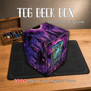 May include: A purple and black TCG deck box featuring a futuristic city illustration and a clear window displaying a trading card. The box includes a magnetic closure and is designed to hold 100 sleeved cards. Text on the image reads TCG DECK BOX.