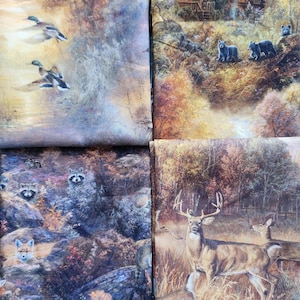 May include: Four fabric squares with nature scenes. One shows ducks in flight, another a cabin with bears, a third with raccoons and a fox, and the last with deer in a forest setting. The fabrics have a vintage, painterly style.