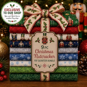 May include: A 9-piece Christmas Nutcracker fat quarter fabric bundle stacked and tied with a holly-patterned ribbon. The fabric features various holiday prints including nutcrackers, snowflakes, and stars in red, green, blue, and cream colors.