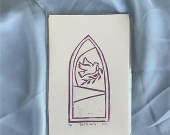 Grabado en linóleo de paloma y acebo