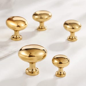 Massief messing kastknop, goudkleurige ovale ladeknop, moderne meubelbeslag, minimalistische keukenkastgreep, kastknop met één gat.