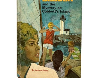 Trixie Belden en het mysterie op Cobett's eiland #13 - 1964 (316)