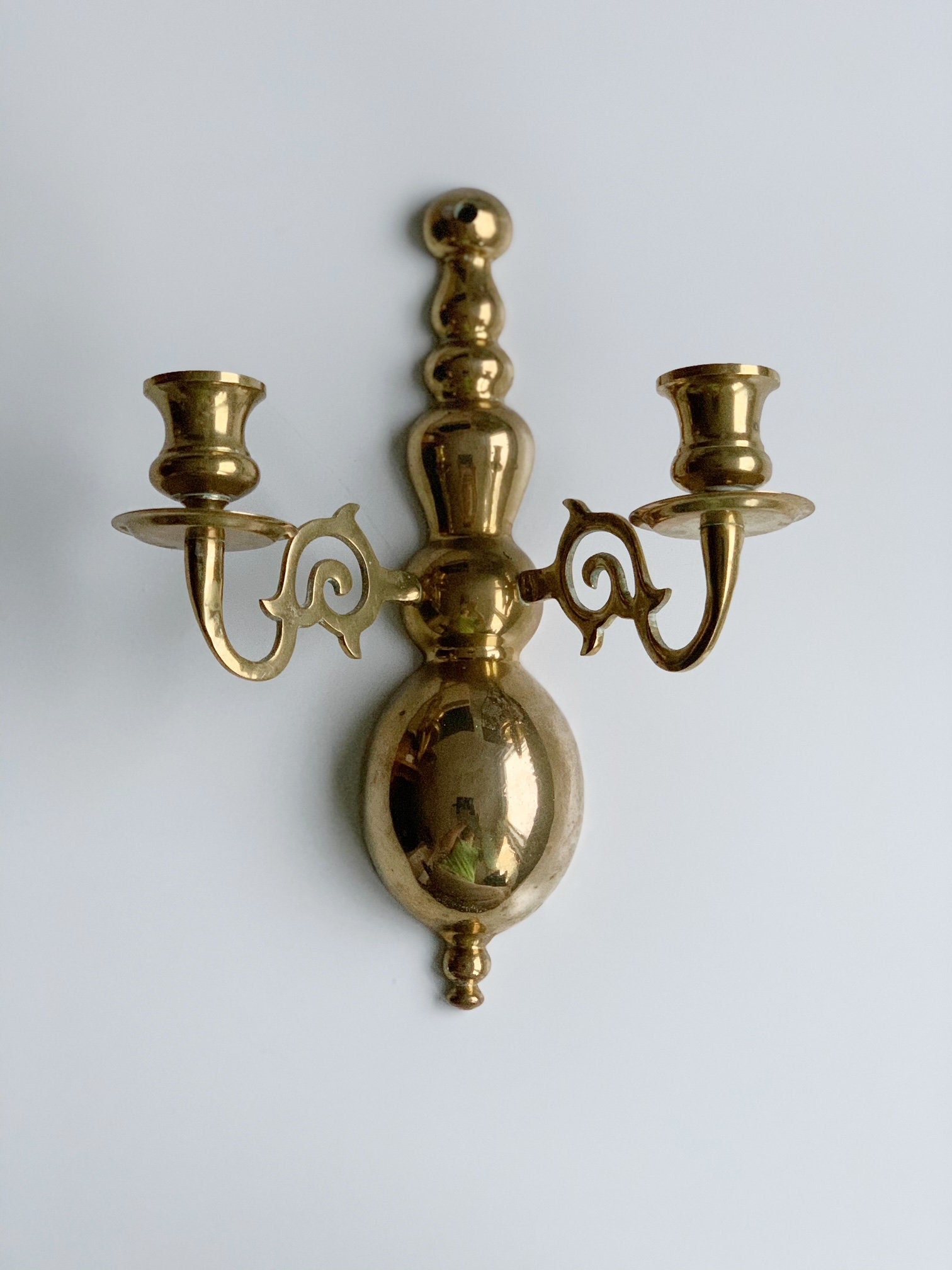 Brass candle wall sconce deals