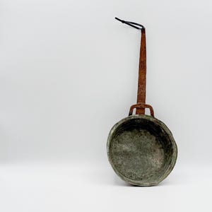Antique copper pan with patina