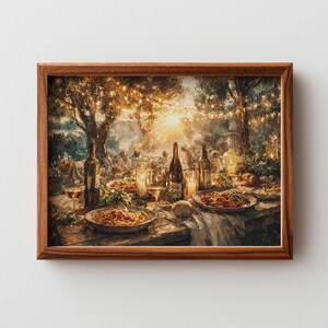 May include: A framed wall art print depicting an outdoor evening dinner scene with plates of pasta, wine bottles, and glasses on a table. The setting is illuminated by warm string lights hanging from trees, creating a golden glow over the meal.