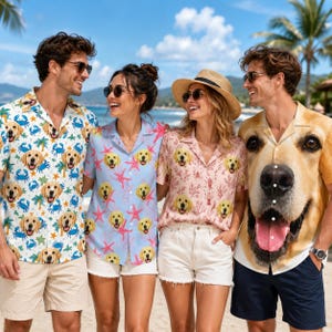 May include: Four individuals wearing short-sleeved button-down shirts featuring golden retriever dog patterns. Two shirts have all-over prints with crabs or starfish, one has a coral pattern, and one features a large golden retriever face.