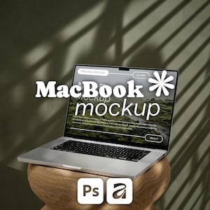 May include: A silver laptop displaying a website interface with the text MacBook mockup, Two Fold Studio, socials, and about. The screen shows a landscape image of green hills. Below the laptop are the Adobe Photoshop and Adobe Illustrator icons.