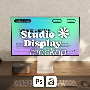 May include: A computer monitor with a thin black frame and a silver stand displaying a gradient screen with the text TWO FOLD STUDIO, Studio Display, and about. A small square computer, a keyboard, and a mouse are positioned on a wooden desk.